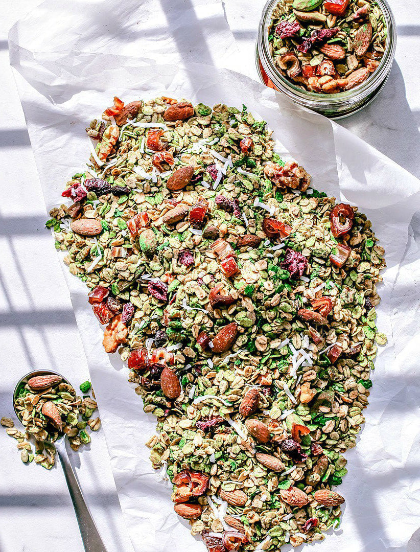 Matcha Granola artfully displayed on white cloth