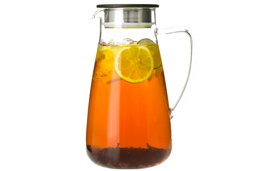 Glass pitcher filled with iced tea and lemon slices