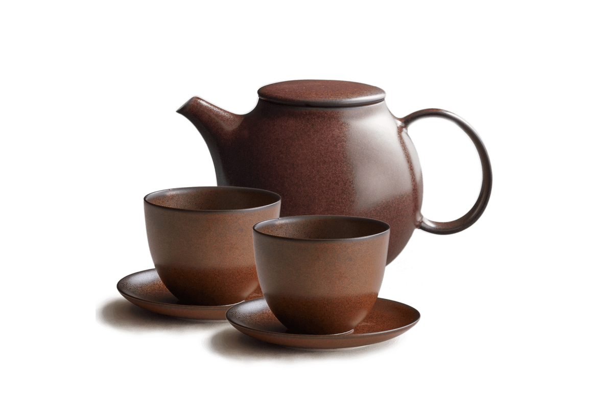 Brown Ceramic teapot and two cups and saucers