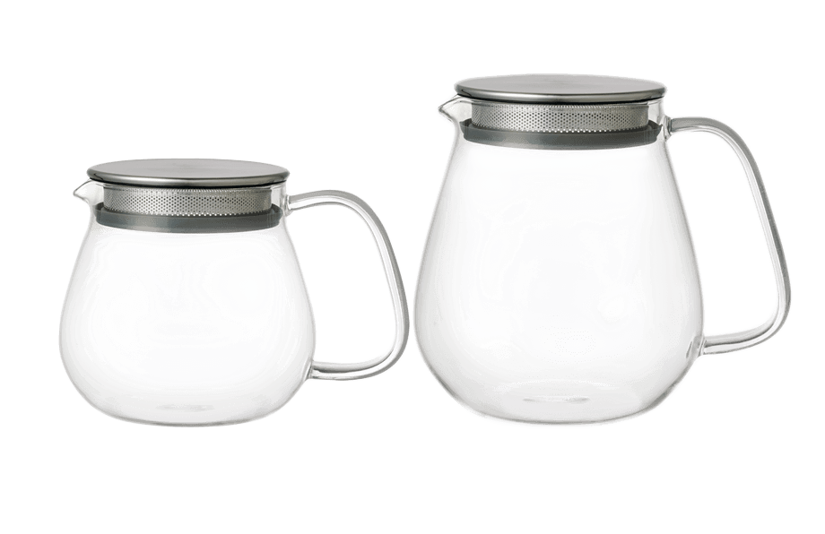 Two clear glass teapots with metal mesh lids