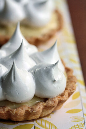 Citrus and Tea Cream tartlet topped with dollops of meringue