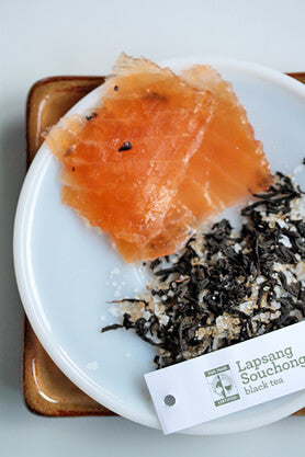 Tea cured salmon on a plate