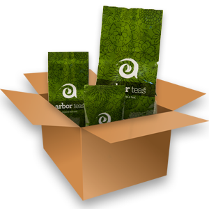 3 green bags in a cardboard box