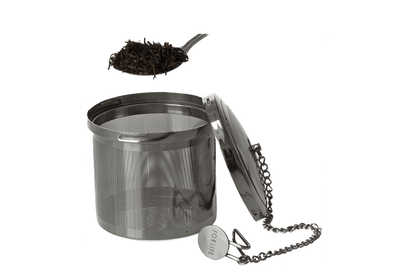 Stainless steel tea strainer with tea leaves