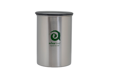 Stainless steel canister with lid, featuring the Arbor Teas logo.