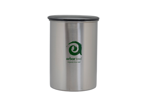 Stainless steel canister with lid, featuring the Arbor Teas logo.