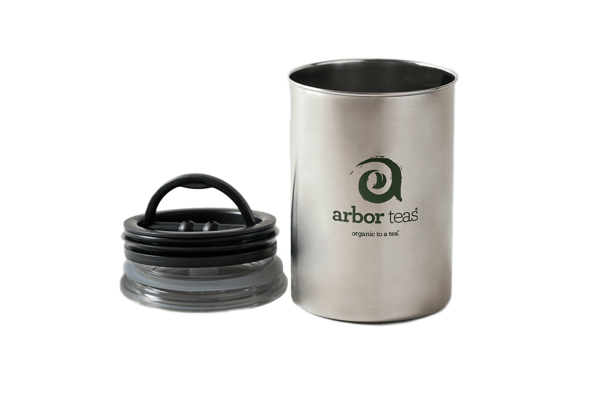 Stainless steel canister with lid, featuring the Arbor Teas logo.