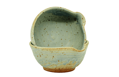 Stacked ceramic matcha bowls with pouring spouts