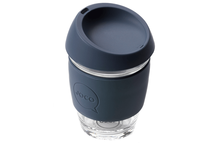 Reusable glass coffee cup with a dark blue lid 