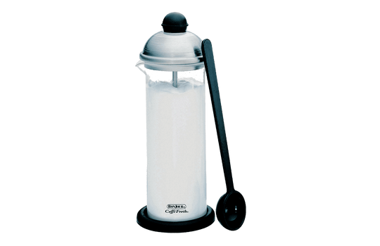 French press style milk frother with a black spoon