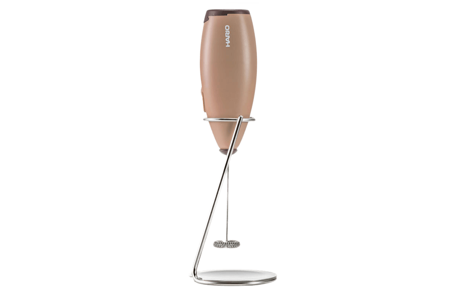 Brown handheld mixer with whisk attachment