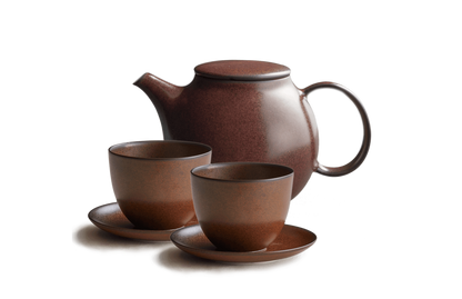 Brown Ceramic teapot and two cups and saucers