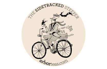 Logo for 'The Sidetracked Steeper' with a person on a bicycle