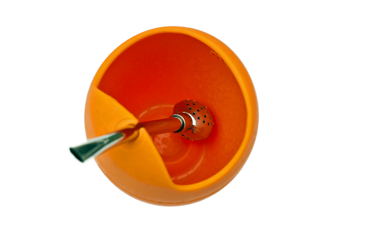 Orange silicone tea gourd with a metal tea straw